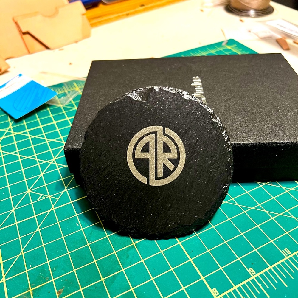 Custom designed slate coaster set